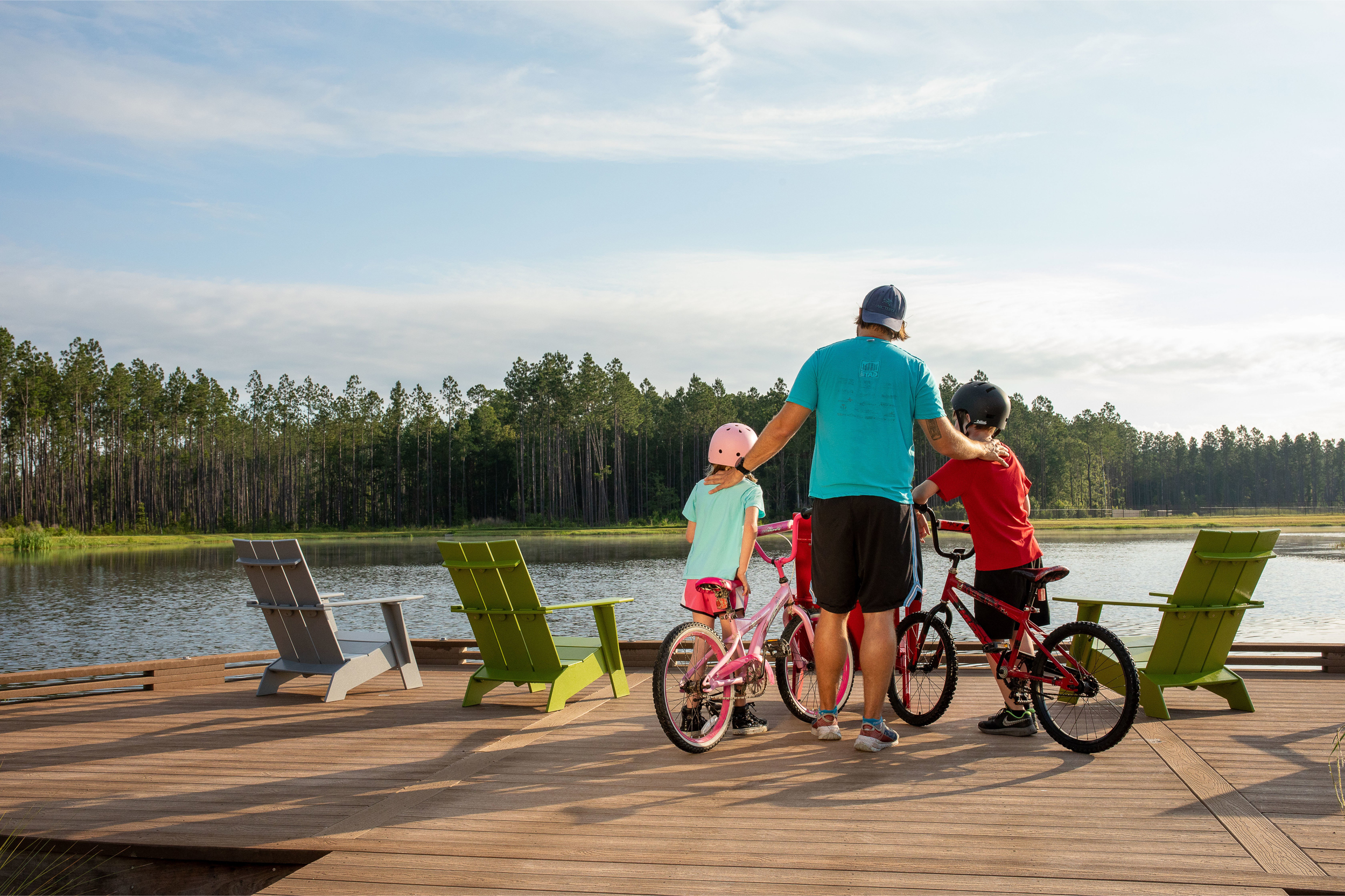 Kids with Dad on Bikes at Water